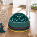 Medium purple slow feeder dog bowl with raised maze pattern